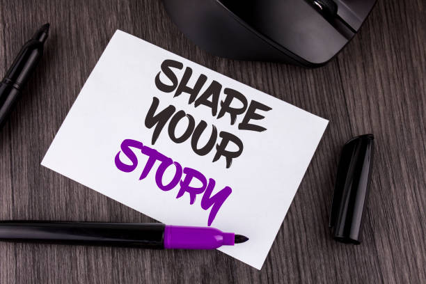 Handwriting text writing Share Your Story. Concept meaning Tell personal experiences talk about yourself Storytelling written on White Sticky Note Paper on the wooden background Mouse Markers
