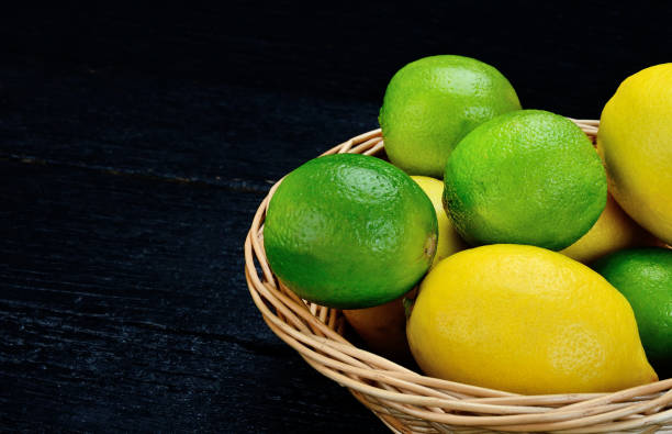 istock cart of lemon and lime on table 949435746