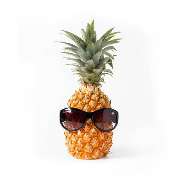 istock Pineapple wearing glasses in summer concept white background 949439300