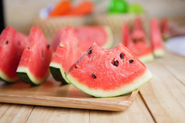 istock Sliced Watermelon fresh on wooden board and bite 949442070