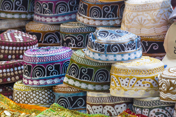 istock Traditional caps at ancient Mutrah Souq, Muscat, Oman 949443014