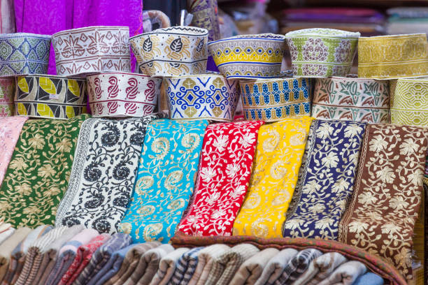 istock Traditional caps at ancient Mutrah Souq, Muscat, Oman 949443098