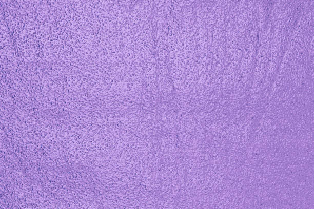 istock Shiny metallized purple foil textured surface for background 949443116