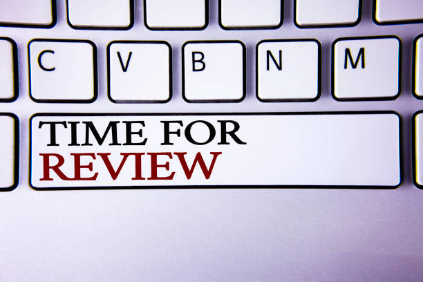 istock Writing note showing  Time For Review. Business photo showcasing Giving Feedback Evaluation Rate job test or product Qualify written on white keyboard key with copy space Top view. 949450006