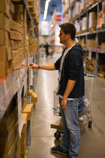 istock Happy man shopping for home 949450782