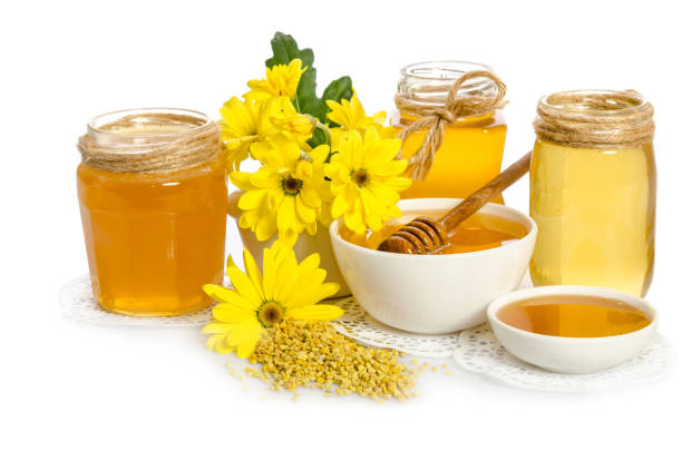 istock beekeeper's still life with yellow flowers 949451190
