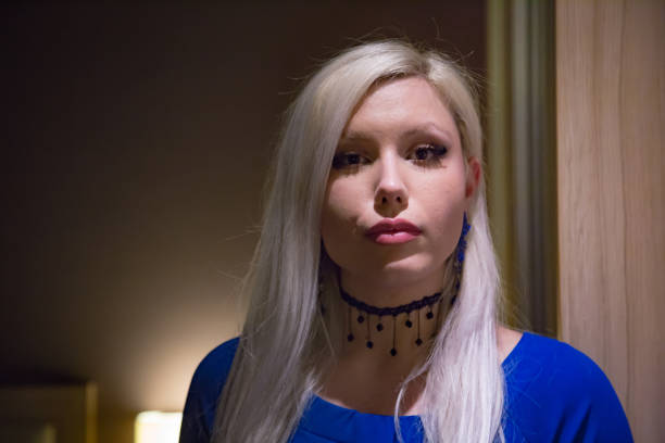 Blonde woman posing indoor