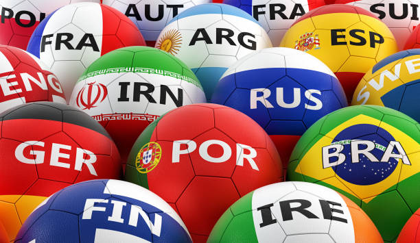 istock soccer balls colored in different national flag colors - 3D rendering 949462260