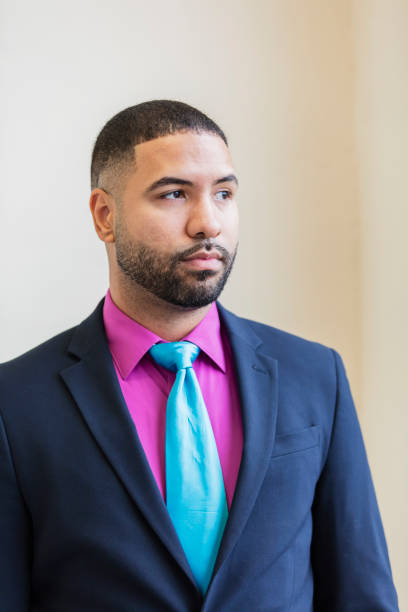 istock Mixed race man wearing a suit and tie 949463440
