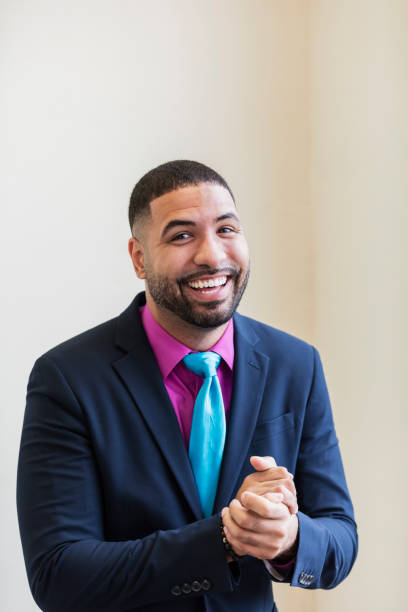 istock Mixed race man wearing a suit and tie 949463574