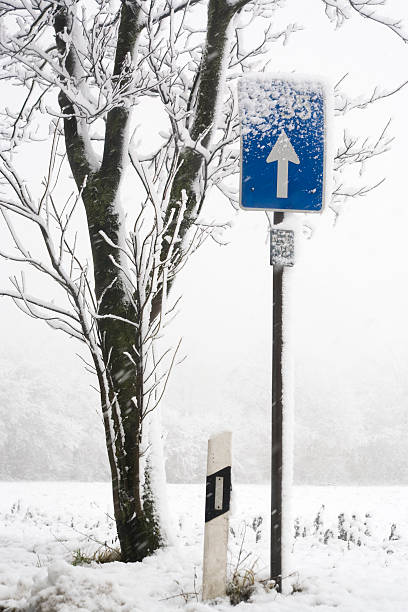 istock up arrow sign in snowfall 94946535