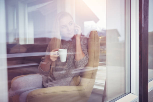 istock Beautiful woman relaxing at home 949467988