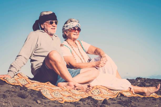 istock hippy aged adult couple 949471492