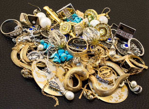 istock Mount of jewelery isolated on black 949472486