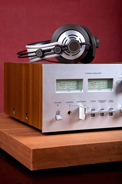 istock Vintage Stereo Amplifier Front Panel and Cabinet with Headphones 949475028