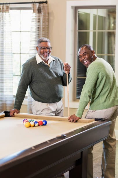 istock Two African-American men shooting pool 949476198