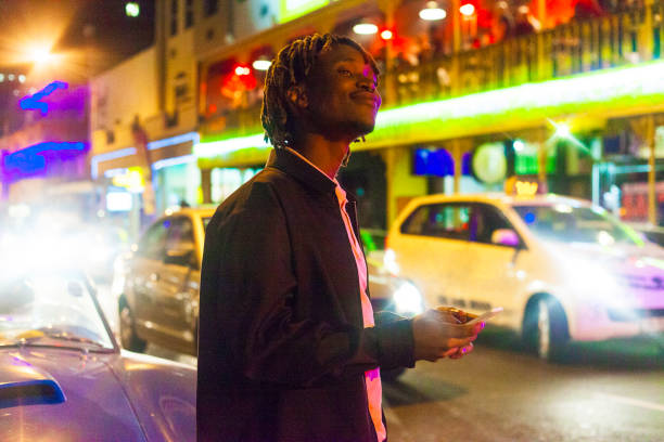 istock Catching a taxi on the street. 949481174