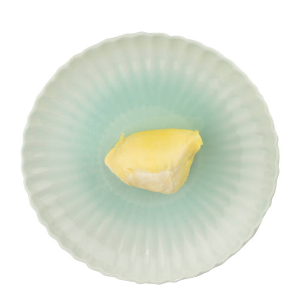 istock durian. king fruit. peeled. on dish. isolated on white background 949482774