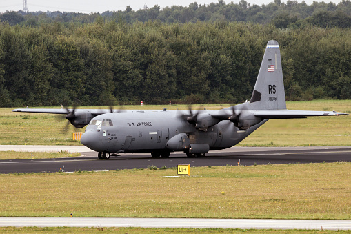 EINDHOVEN, THE NETHERLANDS - SEP 17, 2016: United States Air Force Lockheed C-130 Hercules transport plane based on Ramstein airbase about to take off.