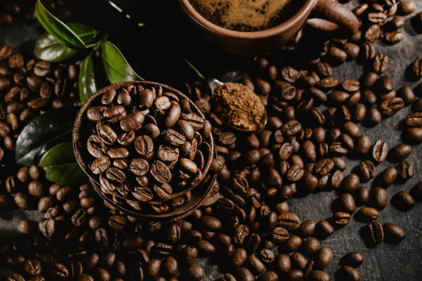 istock Cup of brewed coffee among aromatic beans 949482934