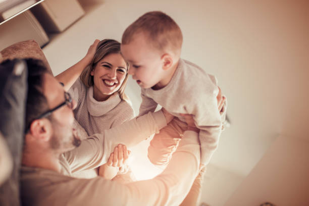 istock Young family having fun at home 949486170