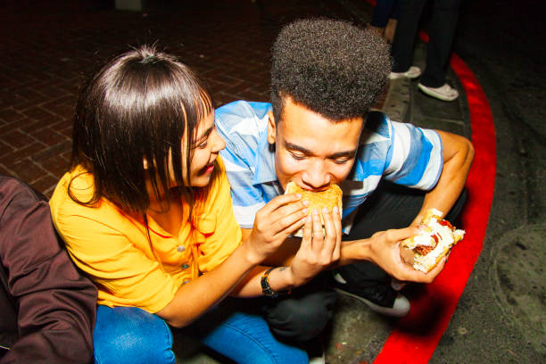 istock Friends sharing food. 949488834
