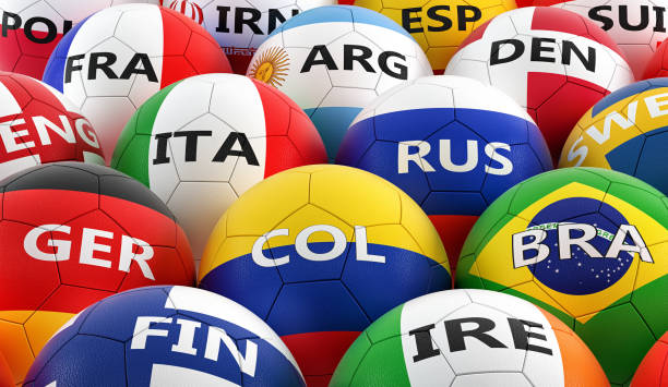 istock soccer balls colored in different national flag colors - 3D rendering 949490088