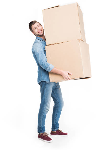 istock man relocating with carton boxes, isolated on white 949490640