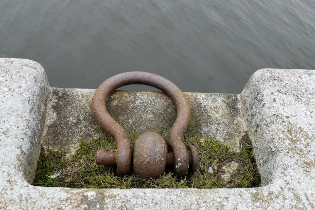 istock Shackles for ship attachment on the shore, pier 949491508