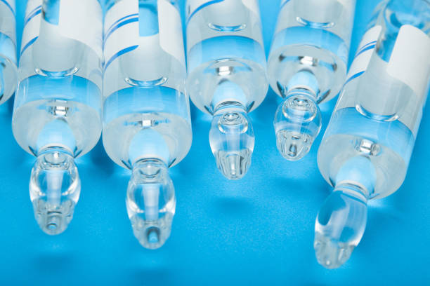istock Glass ampoules with vaccine 949503302