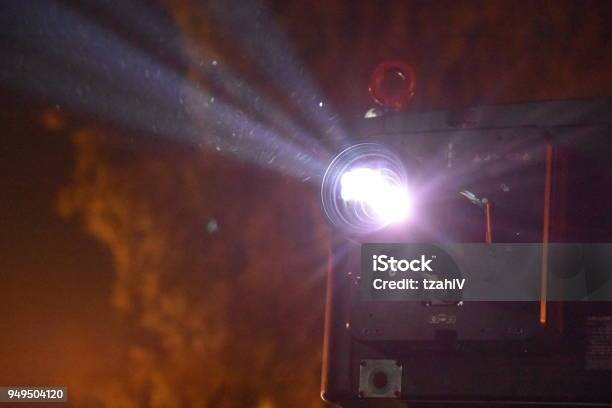 Powerful Projector Stock Photo - Download Image Now - Movie, Outdoors, Night