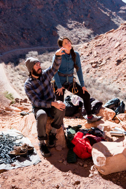 istock Rock Climbing Couple in Moab 949504698