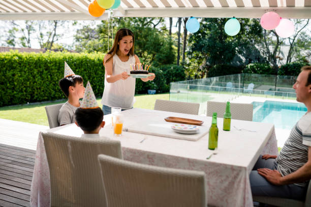 istock Family celebrating birthday 949508556