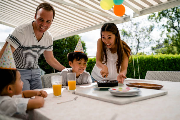 istock Family celebrating birthday 949508596