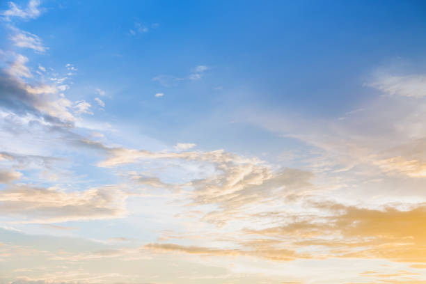 istock Dramatic sunset and sunrise sky with beautiful and colorful nice soft cloud background concept. 949510330