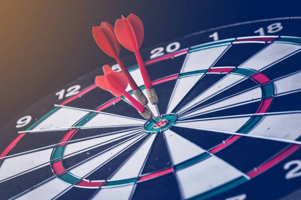 istock Red dart arrow hitting in the target BUSINESS STRATEGY IDEAS CONCEPT 949510470