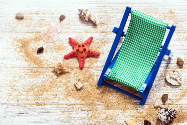 istock Beach accessories on wooden board 949510520