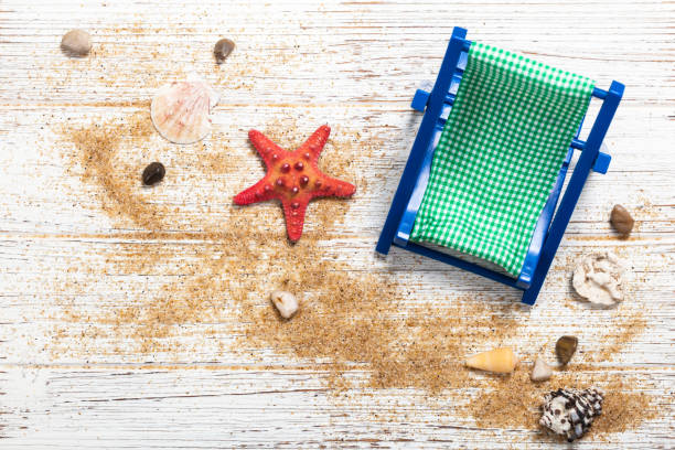 istock Beach accessories on wooden board 949510796