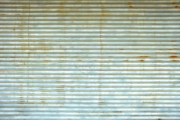istock Old Metal Folding Door Background. 949510832