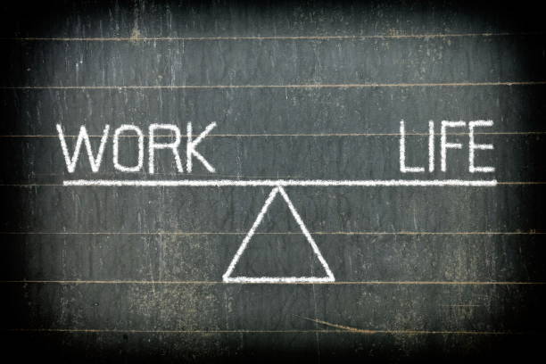 istock Balance of Work and Life Concept on Chalkboard Background. 949514068