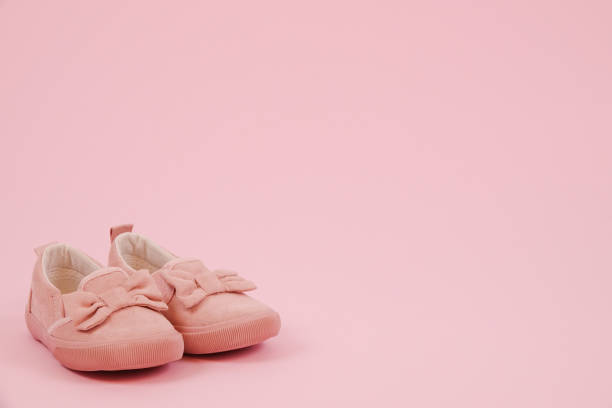 istock Small pink child shoes 949514356