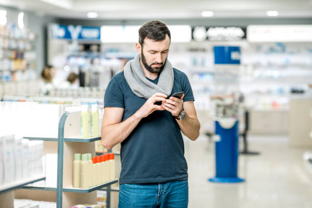 istock Man shopping in the pharmacy 949515324