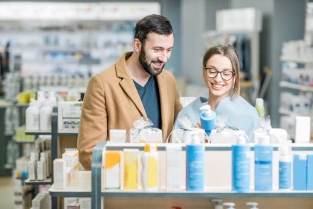 istock Couple choosing cosmetics in the pharmacy 949517876