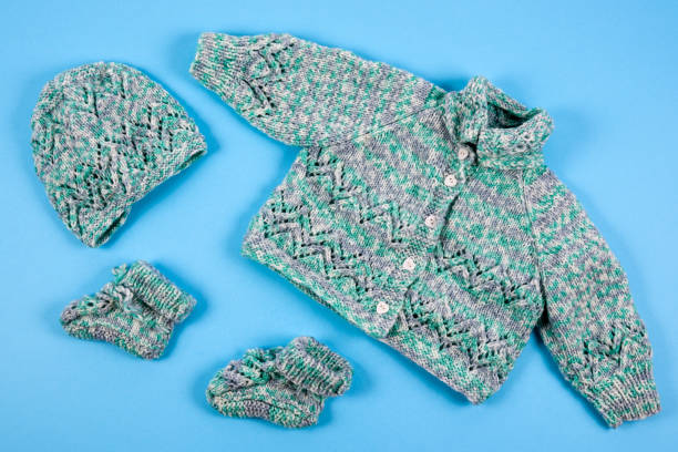 istock Knitted home-made baby boy clothes 949522032