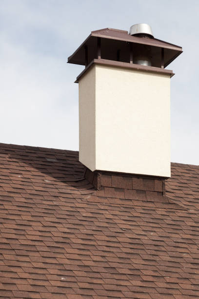 istock New asphalt tile roof with modular chimney 949525840