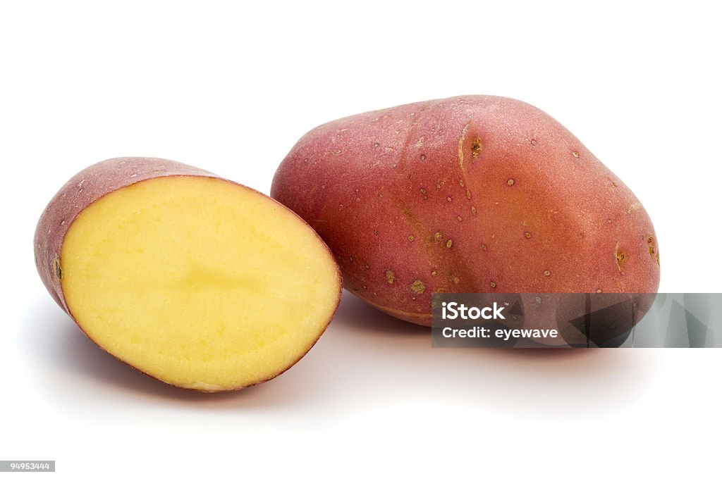 whole and half red miniature potato  Fingerling Potato Stock Photo