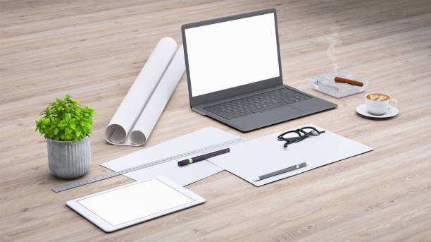 istock Laptop on a desk with accessories, blank screen mock-up isometric 949543764