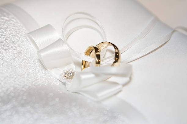 Bride and grooms wedding rings stock photo