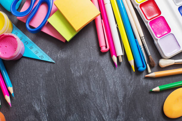 istock School stationery on background blackboard 949561218