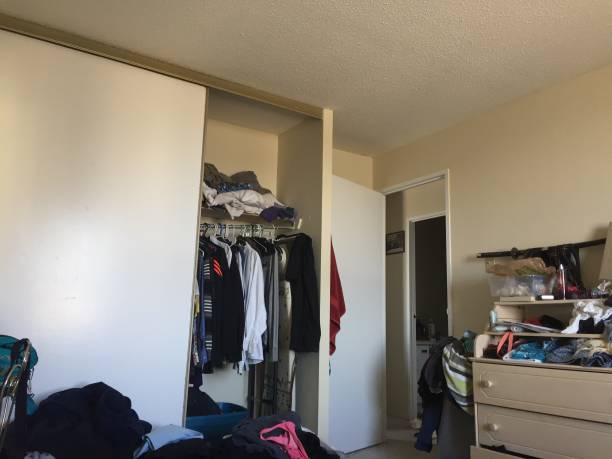 Messy bedroom in student housing bedroom
